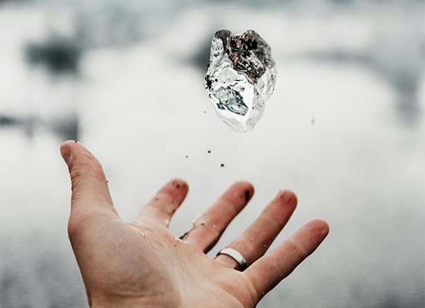 Image of someone tossing a diamond in the air to support diamond mining article