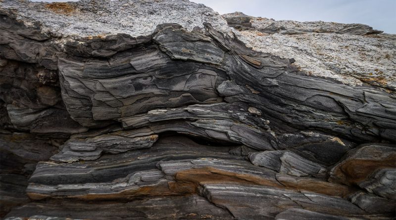 Close up image of the different layers of metamorphic rock