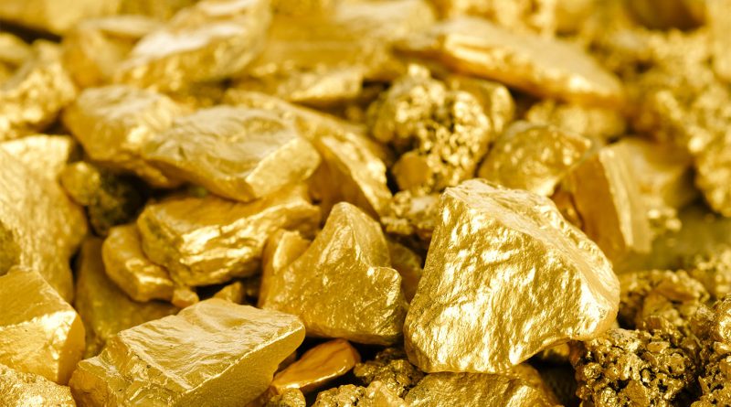 Close-up image of a pile of gold chunks on-top of each other to support uses for gold article