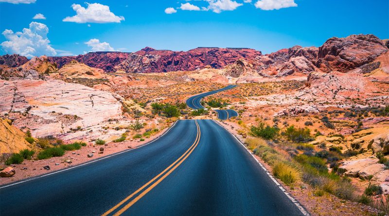 Wide span shot of a long winding road in Nevada to support Lithium article