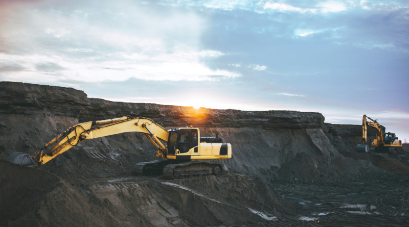 Excavator at a mining site, highlighting innovations in modern mining equipment and technology.