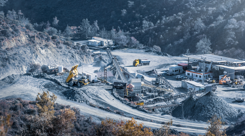 Crushing and screening plant in stone quarry at work, aerial view