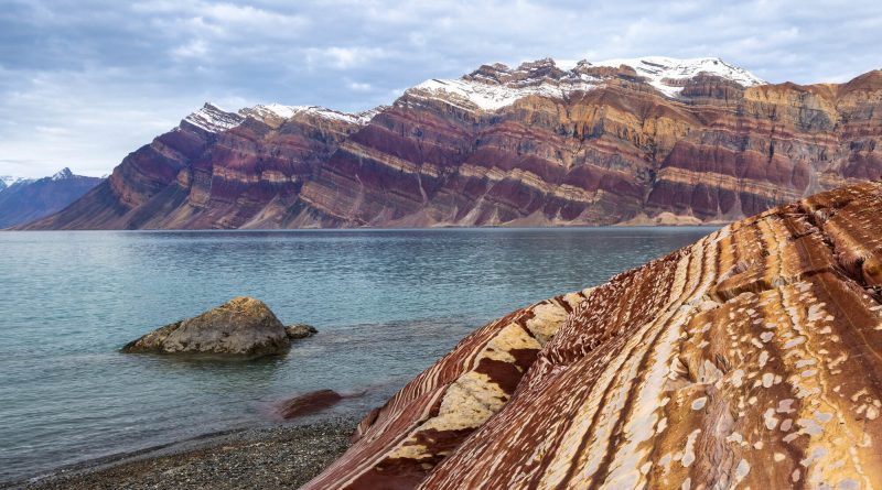 Rocky Arctic landscape in Greenland, where critical mineral deposits are attracting interest from international mining companies.